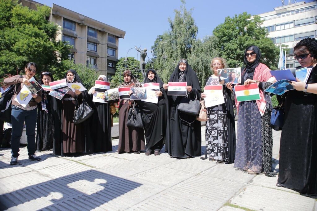Iraqi delegation from "Ship of Life" NGO at Sarajevo's Liberation Square